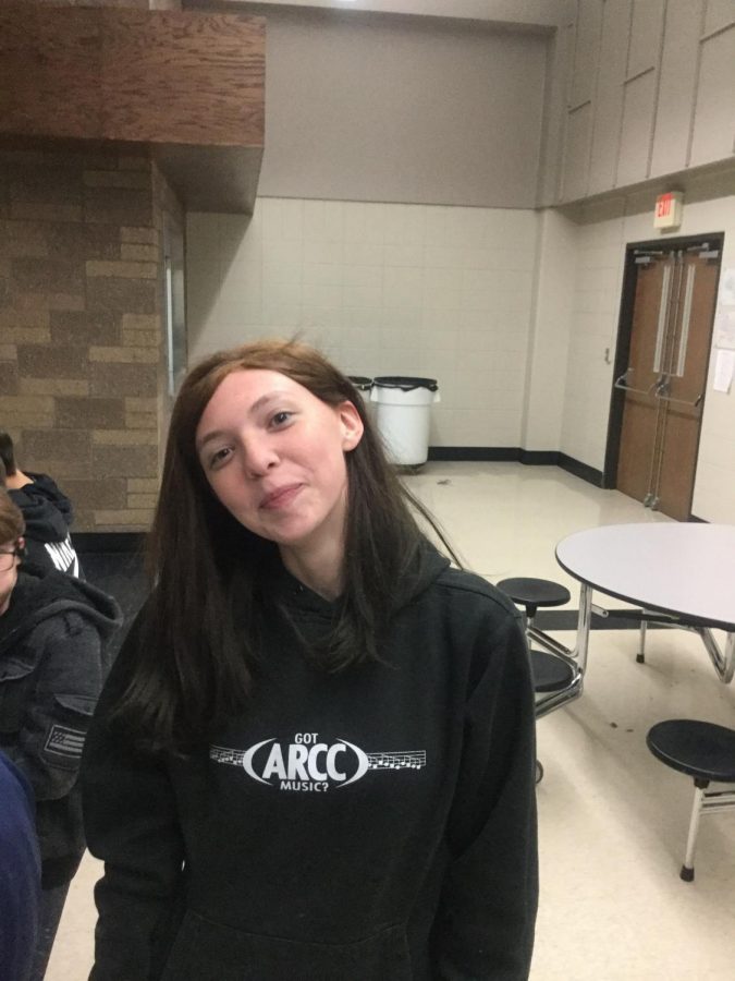 Makenzie Pruden poses in cafeteria.