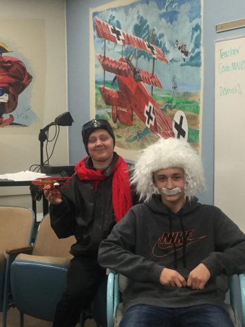 Collin Wilson (left) dressed as the World War I Ace Red Baron and Austin Brandon (right) portraying Albert Einstein.