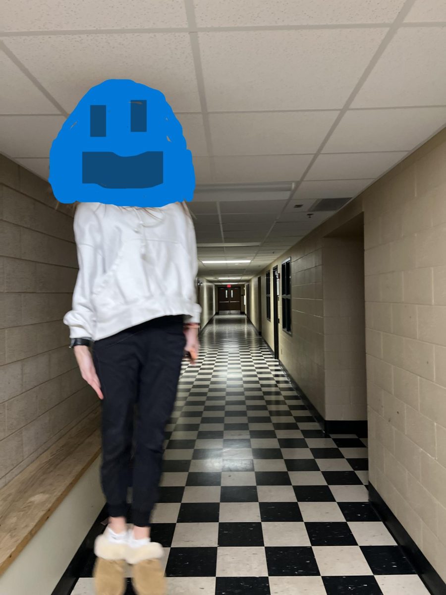 A current student replicating the famous hallway photo.